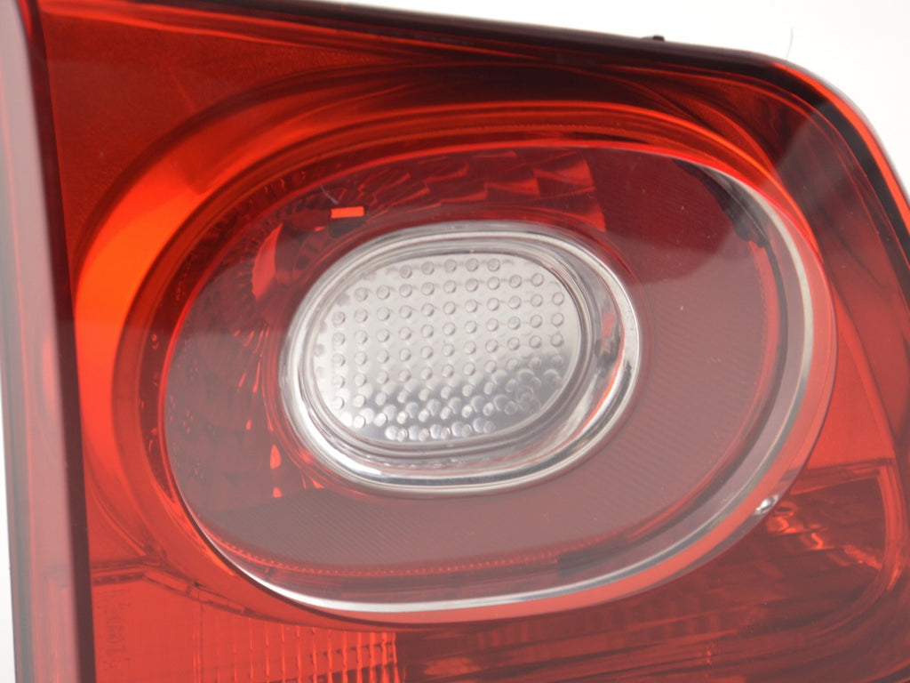 Spare parts rear light left VW Tiguan (5N) 07-11 red / clear