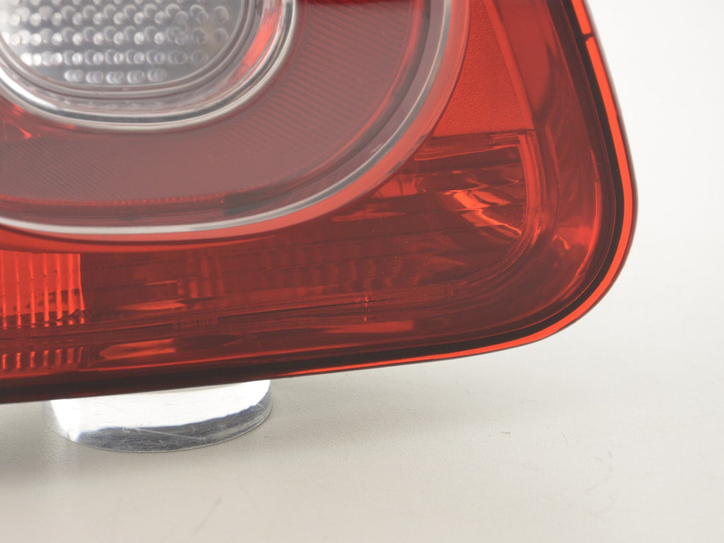 Spare parts rear light left VW Tiguan (5N) 07-11 red / clear