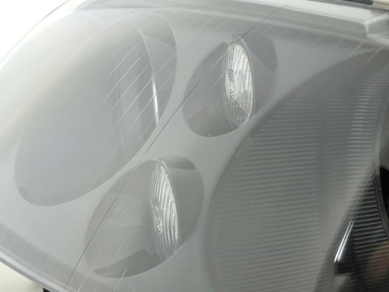 Spare parts headlight left VW Touran (Typ 1T) 03-06