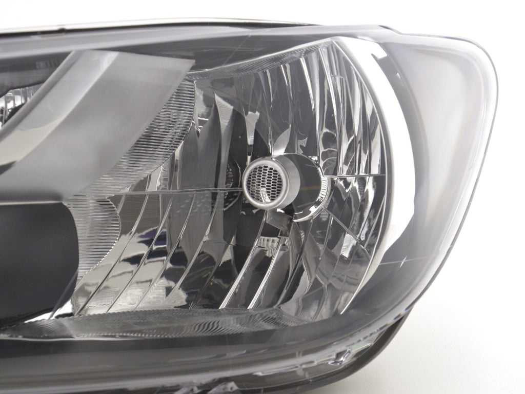 Spare parts headlight left VW Touran (GP2) 10-14 black