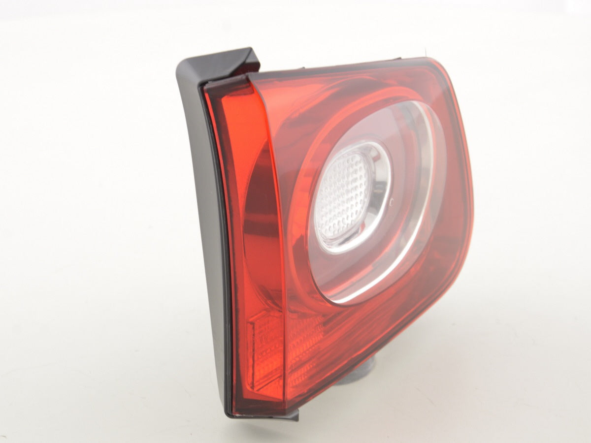 Spare parts rear light left VW Tiguan (5N) 07-11 red / clear